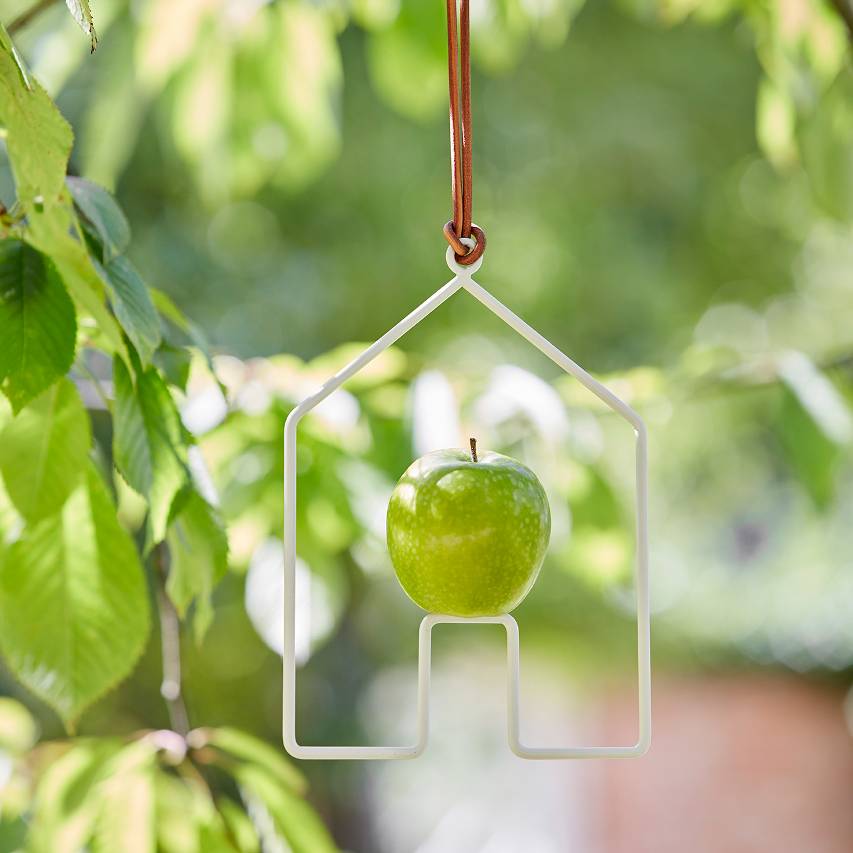 Sophie Conran apple bird feeder with green apple hanging from tree