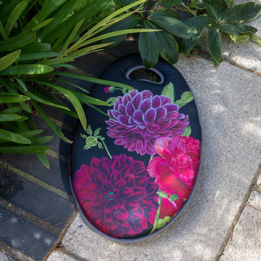 British Bloom garden kneeler on patio next to hellebore