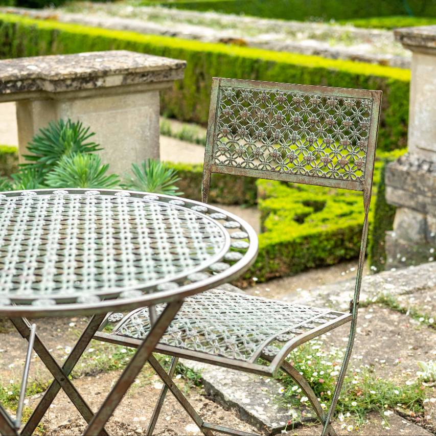 Close up of Marlborough 3 piece bistro set in antique blue rust