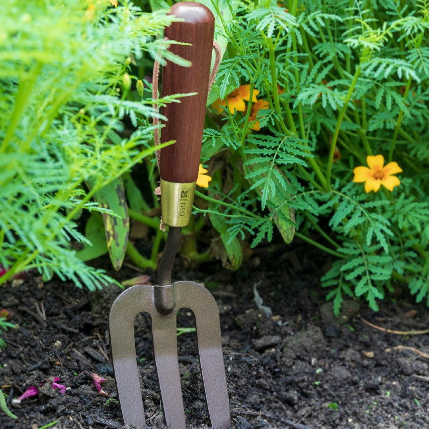 National Trust Burgon and Ball hand fork in border soil